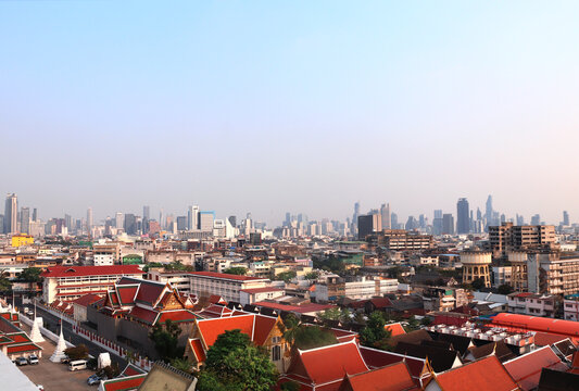 Aerial view cityscape of Bangkok with modern and old residential neighbourhood. Top view of Bangkok from Wat Saket Ratchawora, Thailand. Topic of summer vacation, relaxing, travel, trip, cruises, tour