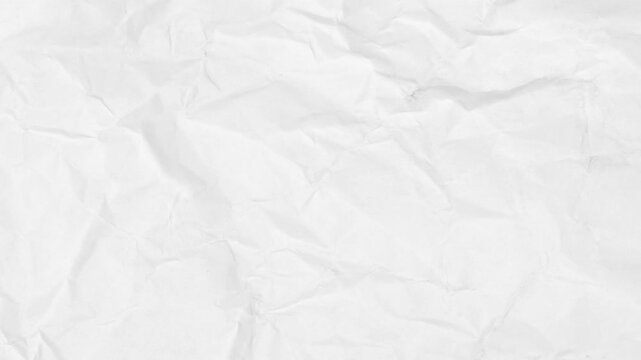 A crumpled white paper background with textured surface and creases