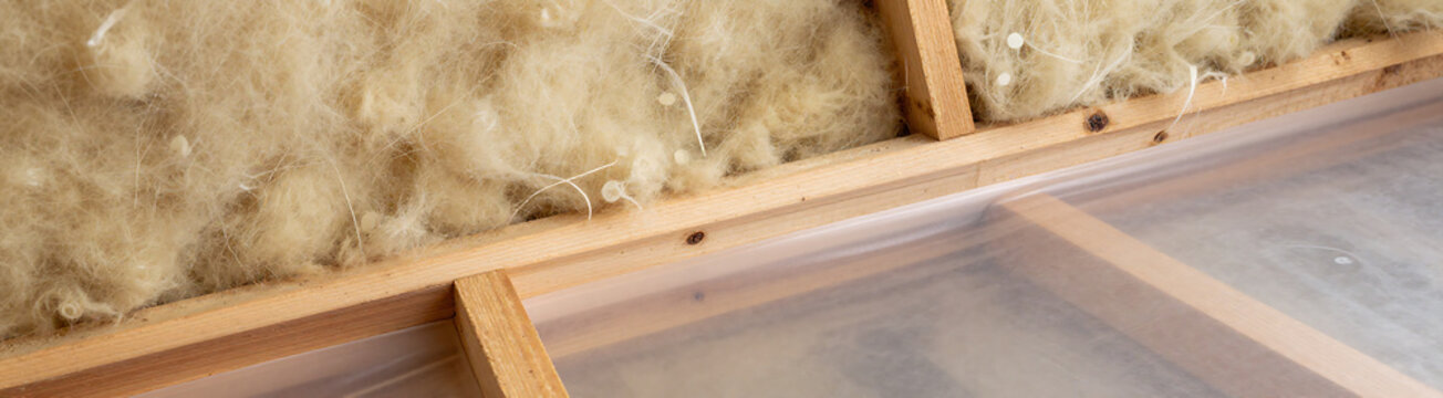 construction mineral wool insulation layered wooden beams covered transparent vapor barrier