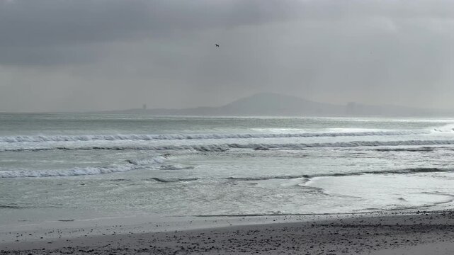 Beach on a stormy winters day in Cape Town, South Africa.