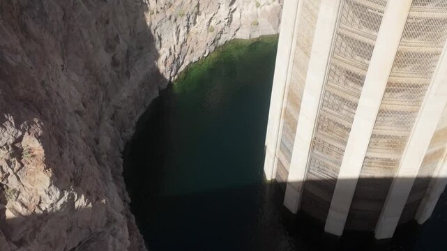 The base of the Penstock Tower reaching into the waters of Lake Mead at The Hoover Dam.