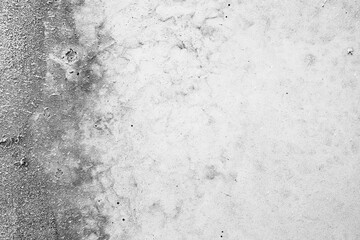 Textured concrete surface with dark gradient side © reddish