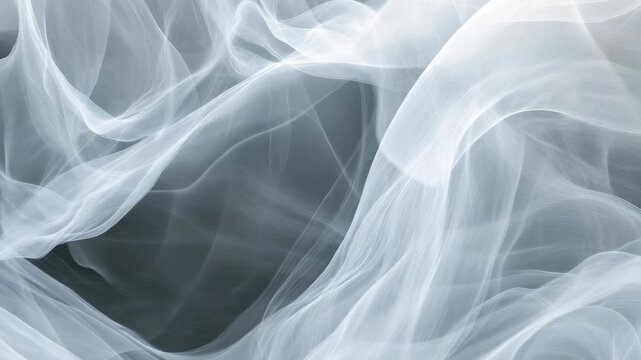 White smoke flows and twists in the dark background. The movement creates interesting shapes as it drifts and blends with shadows. This is an impressive display of smoke patterns