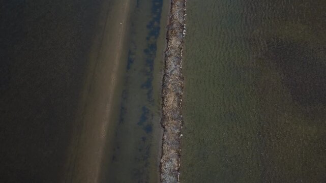 Aerial static shot above salt production landscape in Mesolongi Greece
