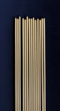 Golden, thin, straight, parallel lines, stripes, illustration, 13 wooden dowel rods
