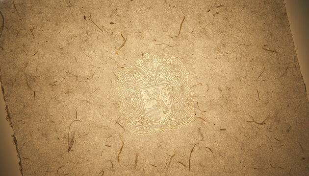 Handmade cotton rag paper backlit texture revealing hidden translucent watermark