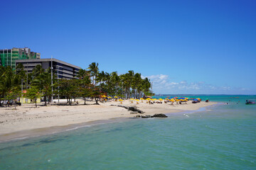 Obraz premium Tropical Ponta Verde Beach with Turquoise Sea and Palm Trees in Maceio, Brazil