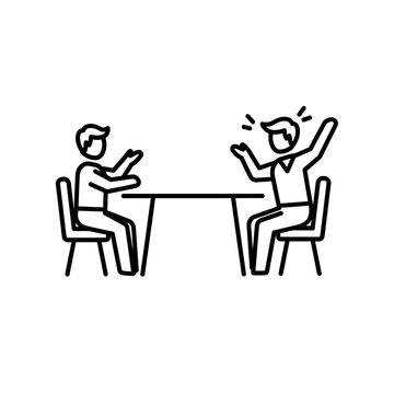 Two men sitting at a table.