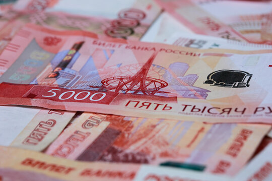New design five thousand Russian ruble banknotes scattered close up