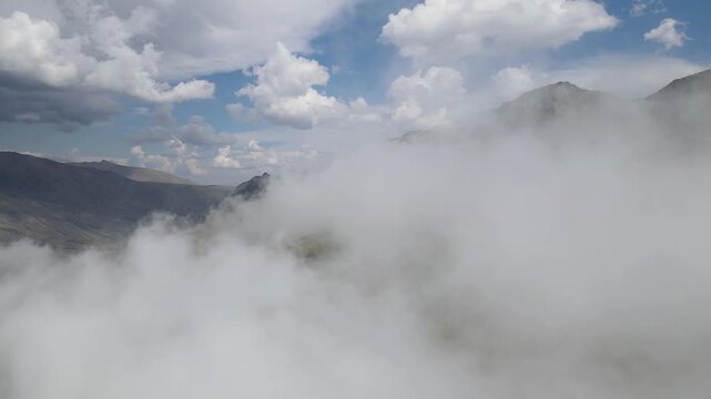 Foggy, cloudy, smoky mountains formed by steep cliffs. Peaks that are hard to reach.