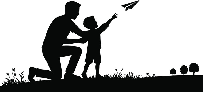 Father teaching child to fly kite