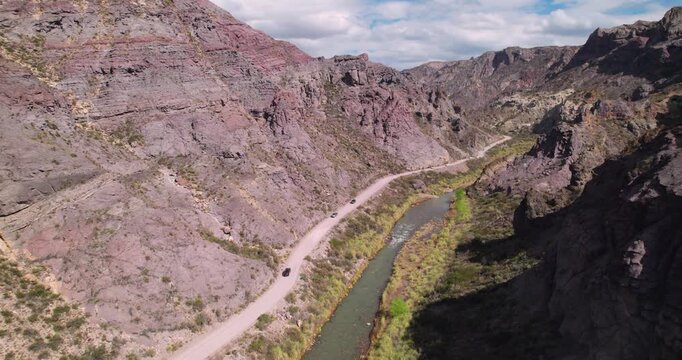 Aerial view of a river and dirt road in Atuel Canyon Mendoza outdoors