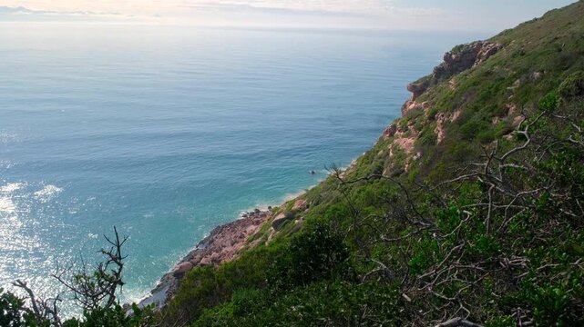 Steep coastal landscape on Robberg Nature Reserve peninsula in Plettenberg Bay