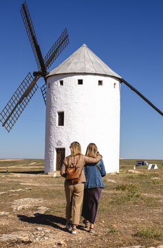 Two Mature Women Friends Visiting a Windmill in the Castilian Countryside