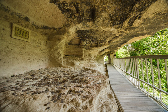 Varna, Bulgary, 1 July 2025: Cave terrace with wooden walkway at Aladzha Monastery Bulgaria
