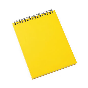 Yellow notepad standing upright with spiral binding