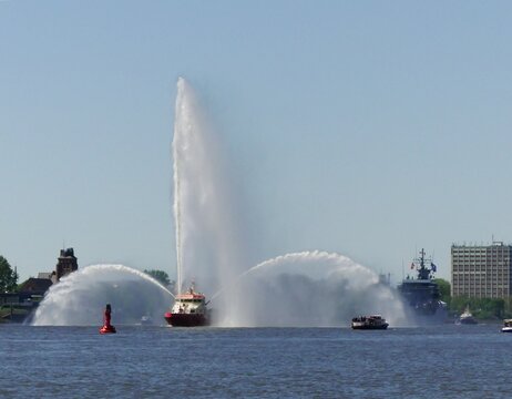 Fountain in rainbow. Fireboat