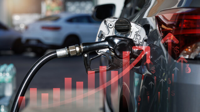 Rising gas price causes stressful energy crisis and high fuel cost shown by an upward red graph overlay on pump nozzle fueling vehicle