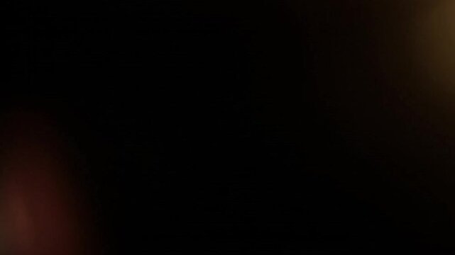 Subtle Warm Amber Top Bottom Light Leak Effect Overlay Dual Glow Cinematic Dark Vignette Moody Abstract Background Fade Transition Video
