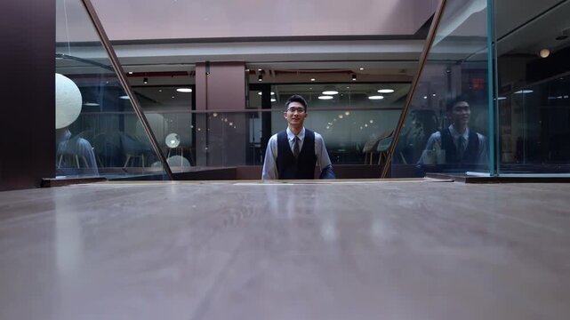 Confident businessman in a formal suit holding a leather briefcase goes upstairs containing necessary materials for upcoming meeting attend significant event opportunities in corporate environment