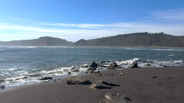 La Boca Chile beach coastal river mouth landscape waves sand scenic village shoreline