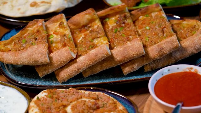 Full Turkish Family Feast Table with Traditional Food, Grilled Meat, Meze and Rustic Bread
