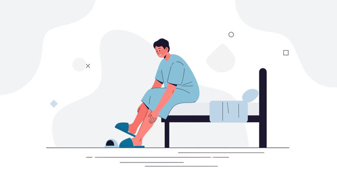 Patient sitting on hospital bed, feeling unwell