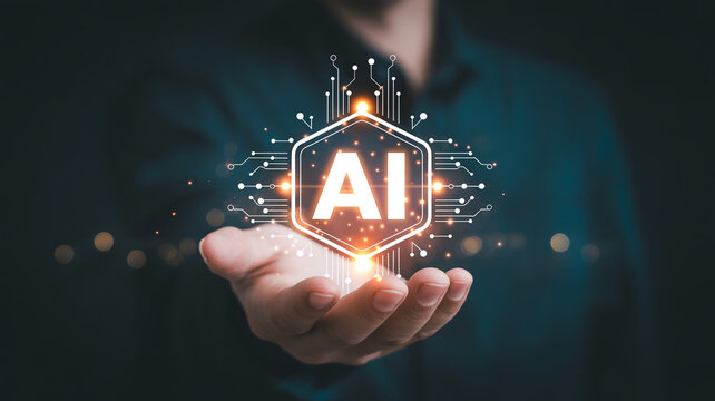 A person&rsquo;s outstretched hand displays a glowing hexagonal AI symbol representing innovation and digital transformation in technology development.