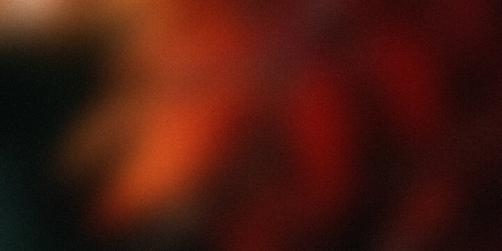 Dramatic red and black bokeh background with intense grainy texture creates mysterious glowing atmosphere for dark creative.