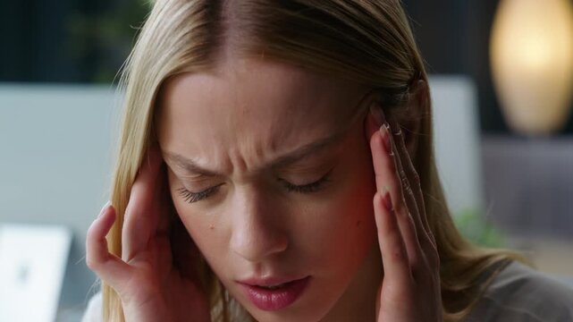 Busy stressed Caucasian student girl business woman with headache pain ache head painful migraine touching temples female overwhelmed fatigue with work job working overload in office medicine concept
