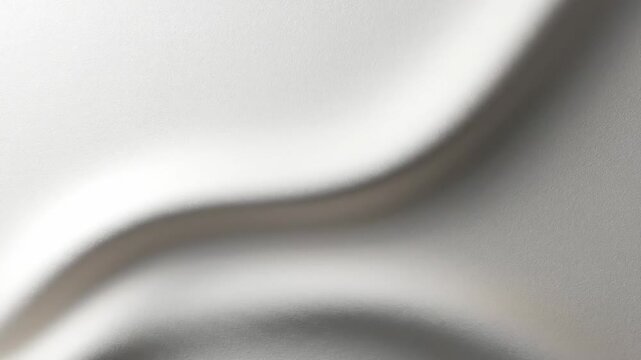 A luminous, flowing, ethereal surface with smooth, undulating curves and gentle light diffusion presents an abstract, organic form suggesting depth and subtle texture perfect for sophisticated