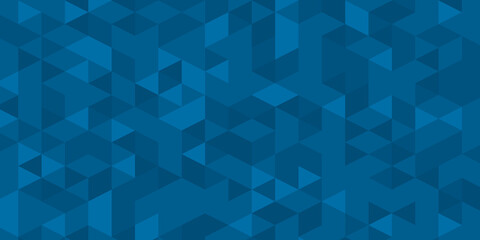 Fototapeta premium Abstract geometric background with a mosaic of blue triangles and squares, clean modern pattern, digital design.