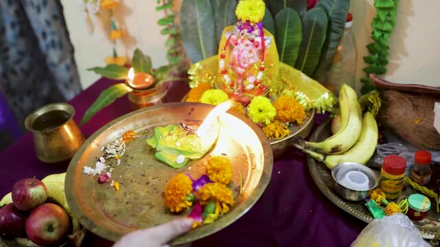 devotional ganesh chaturthi celebration with sacred aarti ritual at home temple