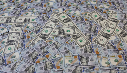Fototapeta premium Word TAX made of one dollar bills on hundred US dollar banknotes background
