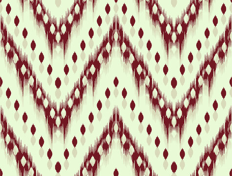 Seamless ikat chevron pattern with traditional ethnic embroidery texture.
