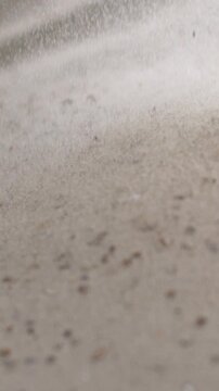 Super Slow Motion Fine Textured Surface With Miniature Mineral Particles Gently