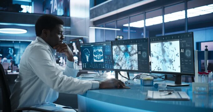Black Scientist Uses a Lab Workstation With AI Microscopy and Radiology Infographics, Mapping Cellular Pathology Into Disease Cure, Drug Discovery and Precision Care. Medium Side Shot, Static.