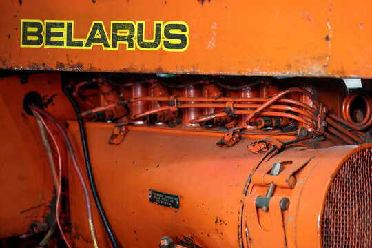 Perth, Western Australia, Australia - May 3 2026: 1972 to 1978 Belarus LTZ 420. Close-up vintage tractor logo, emblem, symbol, brand name. Orange color. Antique farming, agriculture history