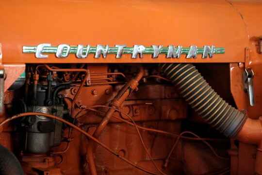 Perth, Western Australia, Australia - May 3 2026: 1962 to 1965 Chamberlain Countryman. Close-up vintage tractor logo, emblem, symbol, brand name. Orange color. Antique farming, agriculture history