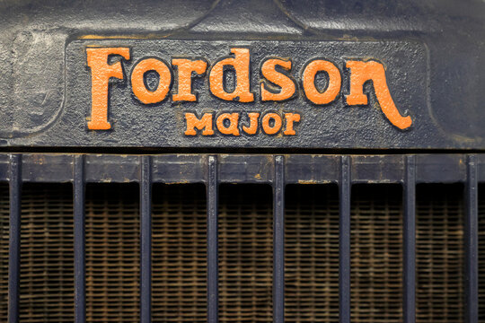 Perth, Western Australia, Australia - May 3 2026: 1949 Fordson Major Half track. Close-up vintage tractor logo, emblem, symbol, brand name. Orange color. Antique farming, agriculture history