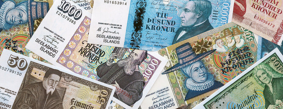Icelandic krona money banknotes pile on table. Iceland bills of ISK currency. Concept of economy