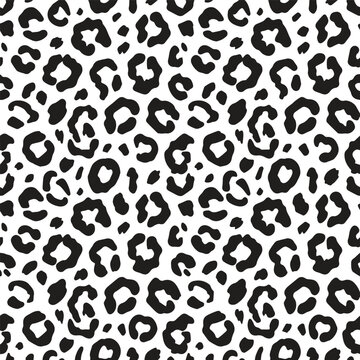 Leopard print pattern in black and white with seamless repeating background