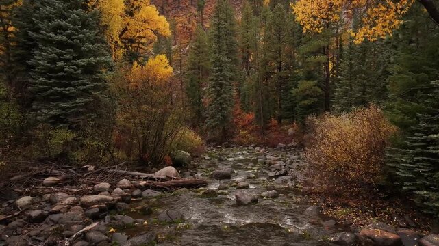Aerial drone footage of Williams Creek Reservoir and Wolf Creek Pass during colorful autumn season