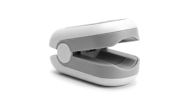 Portable digital pulse oximeter resting open on plain white background side profile studio view