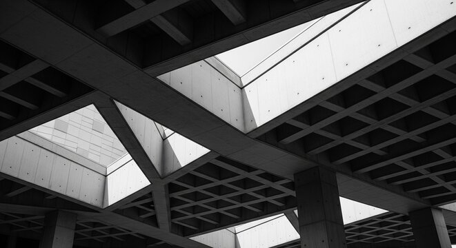 Modern concrete ceiling with geometric patterns and natural skylight