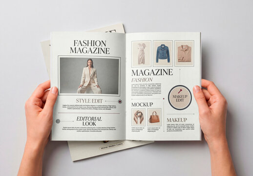 Hands holding open blank magazine mockup on background