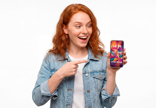 Woman holding smartphone showing blank screen