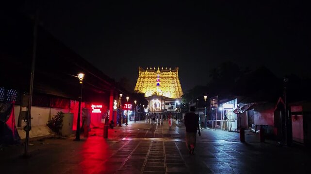 Sacred early morning walk for Nirmalya Darshanam at the world's richest Sree Padmanabhaswamy Temple Thiruvananthapuram. Witness the glowing golden gopuram as devotees gather for pre-dawn divine ritual