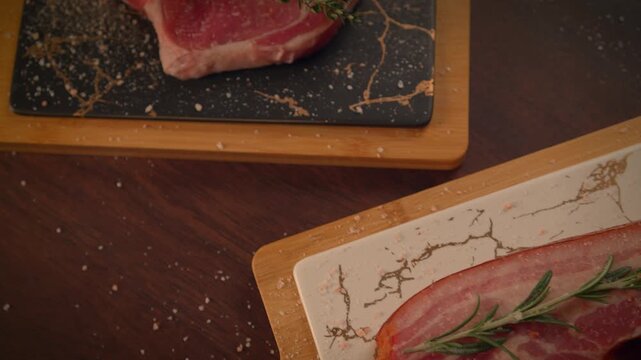 Fresh organic raw beef steak with rosemary food background