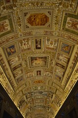 Obraz premium Ornate Renaissance Ceiling with Frescoes and Gold Details